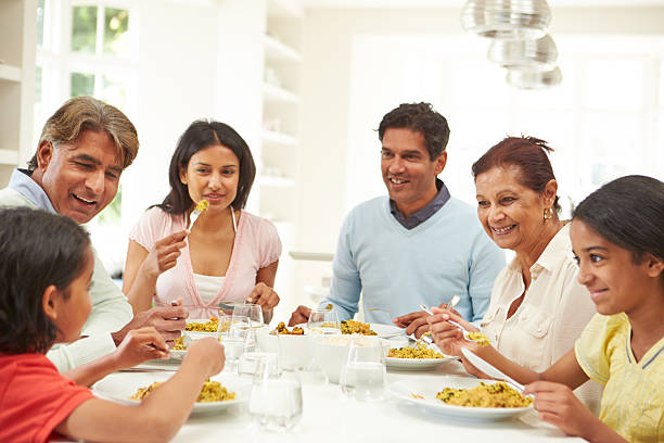 istock Multi Generation Indian Family Eating Meal At Home 456540829