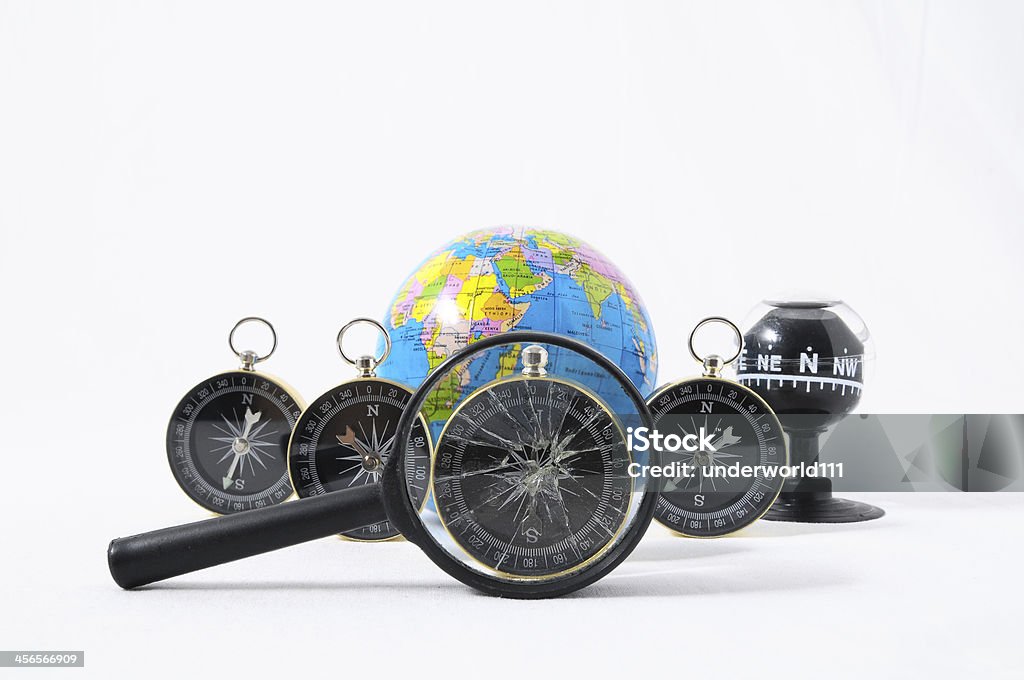 Orientation Concept Orientation Concept Earth,Magnify Glass and Compass on a White Background Camping Stock Photo