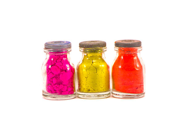 istock three colorful indian ritual paint bottles isolated on white 456580625