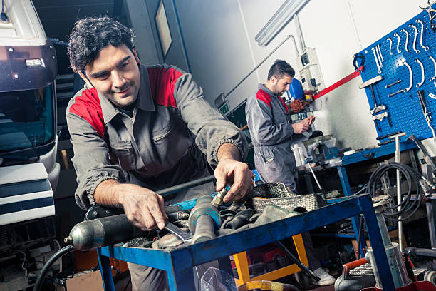 istock Mechanics working on a truck 456581547