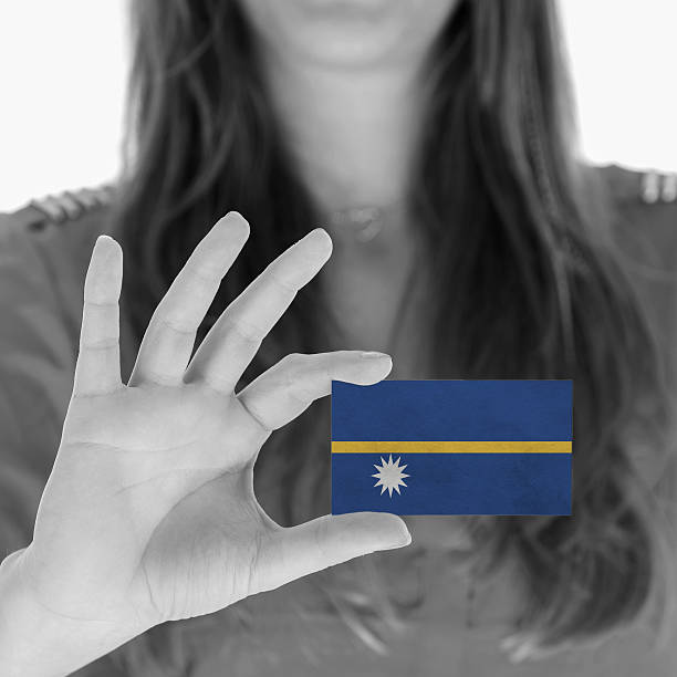 istock Woman showing a business card 456582787