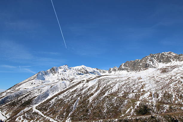 istock Vapor Trail, Blue Sky and Snow, Panorama Hirschebensee, Tyrol, Austria 456614415