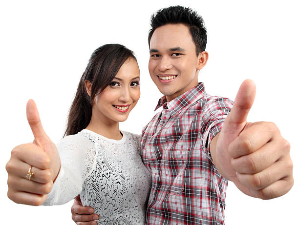 istock couple two thumbs up sign 456626539