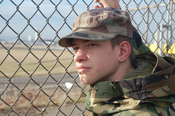 istock Military Man and Fence 456733277