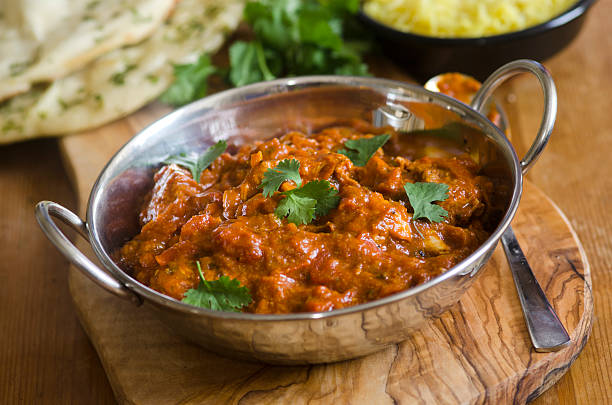 istock Indian Chicken Balti dish in a silver bowl 456740071