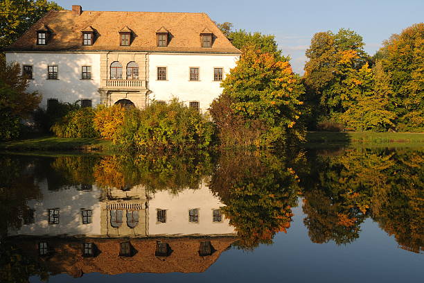 istock Bad Muskau Old Palace at Fall Lake Sunrise 456740903