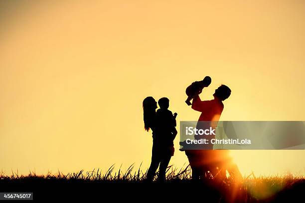 Silhouette Of Happy Family And Dog Stock Photo - Download Image Now - Family, In Silhouette, Dog