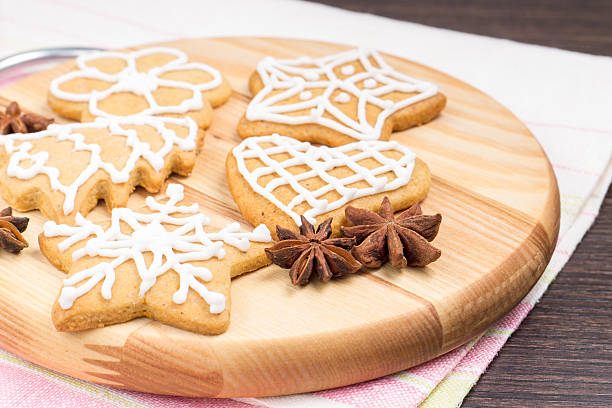 istock Gingerbread cookies on round wooden board 456747659