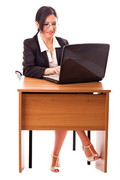 istock Young Secretary At Her Desk 456748389