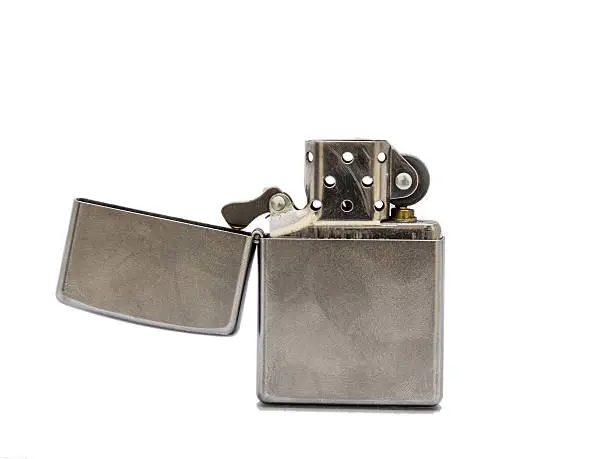 Photo of Silver metal zippo lighter isolated on white