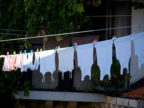 clothesline clothesline dachpfannen stock pictures, royalty-free photos & images