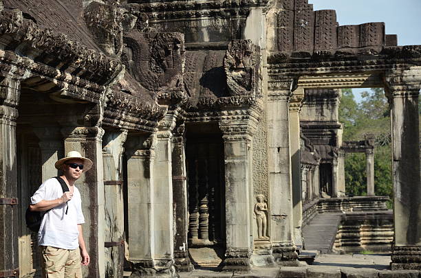 istock Man in bayon temple cambodia 456788129