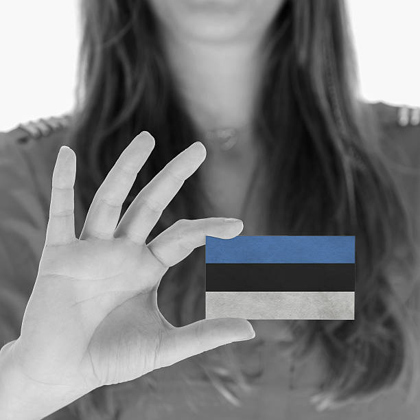 istock Woman showing a business card 456855619