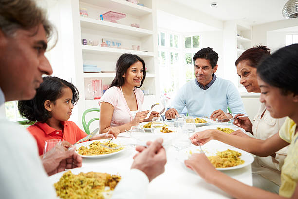 istock Multi Generation Indian Family Eating Meal At Home 456859105