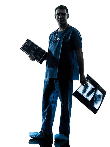 istock doctor surgeon radiologist silhouette 456859383