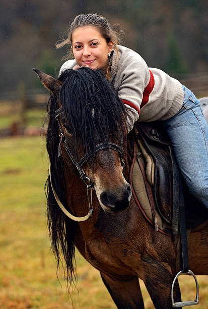 istock Girl with Horse 456860417