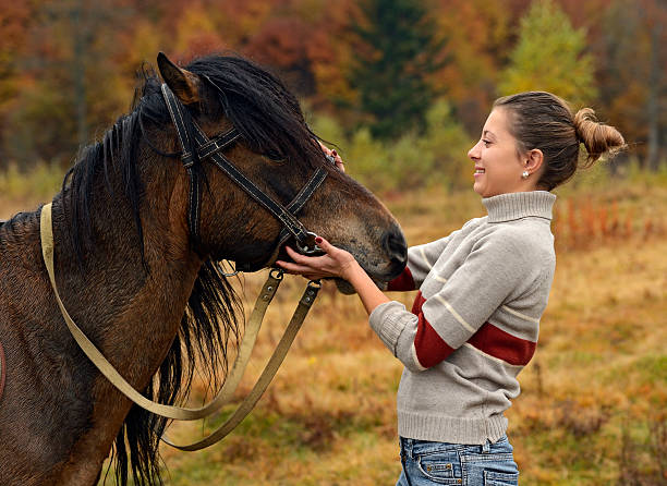 istock Girl with Horse 456860487
