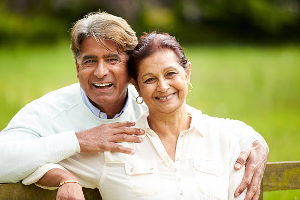 istock Senior Indian Couple Walking In Countryside 456860497