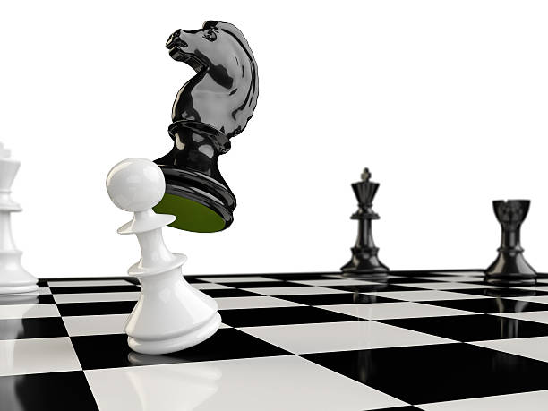 The horse eats the pawn knocking him to the ground, in the background appear the two kings and a tower