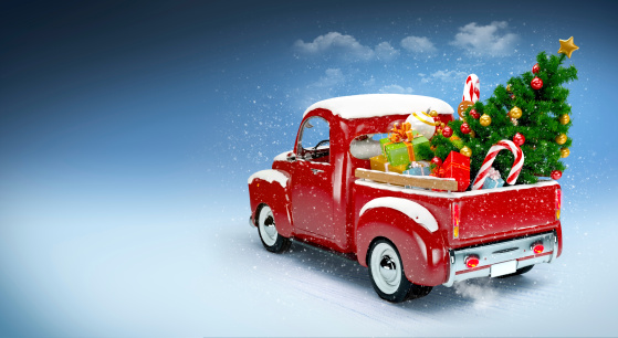 Christmas background. Pickup with christmas tree and gifts. Merry Christmas and Happy New Year