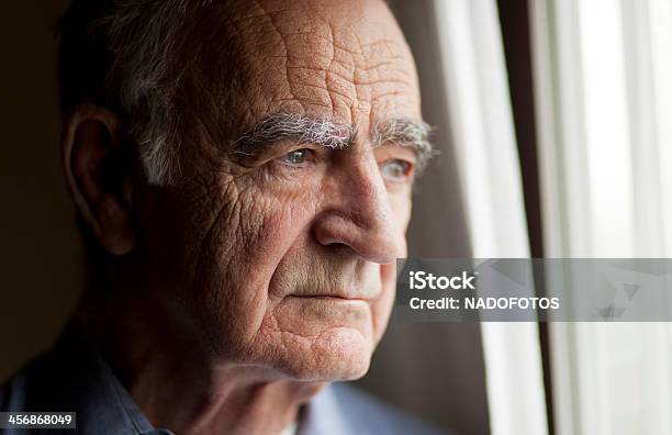 Portrait Of Elderly Man Lost In Thought Stock Photo - Download Image Now - Senior Adult, Senior Men, Sadness