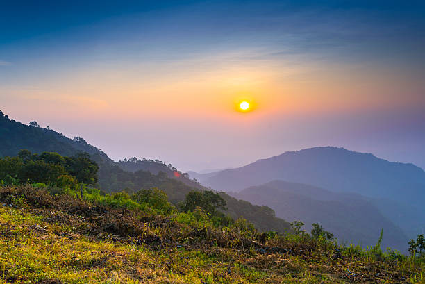 istock Beautiful sunshine at misty morning mountains . 456874559