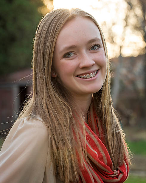 istock Girl with Braces Smiling 456874575