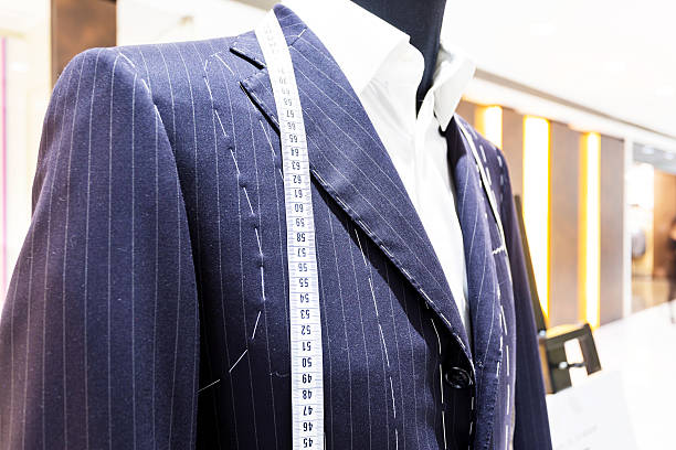 istock Suits on shop mannequins 456880543