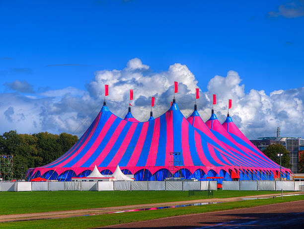 Huge Big Top Circus Tent, Buit up for a Music Festival on a Sunny Day in the Park