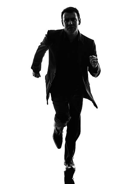 istock Silhouette of a man in a suit on white background 456884153