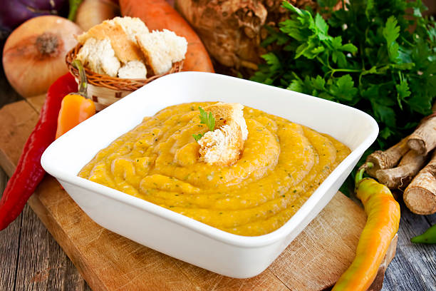 istock Vegetable cream soup with croutons 457038259