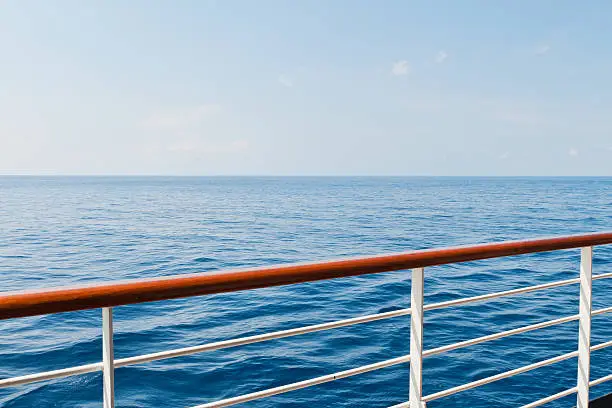 Looking at the sea from the deck of a cruise ship