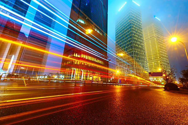 istock light trails on modern building background in shanghai 457041189