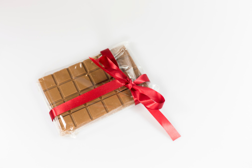 Chocolate Bar isolated on white with Red Ribbon