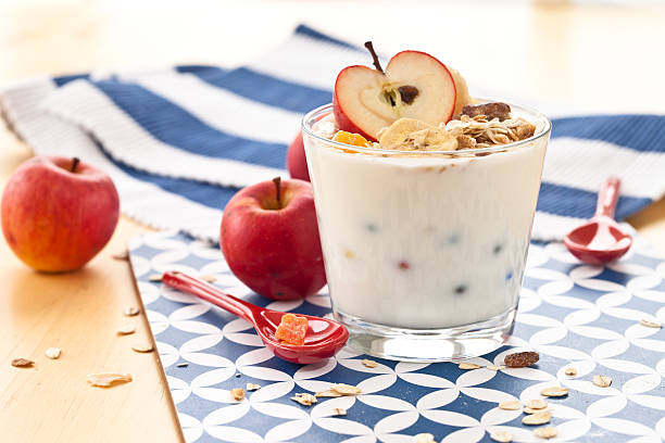 Muesli with yoghurt and apples for breakfast