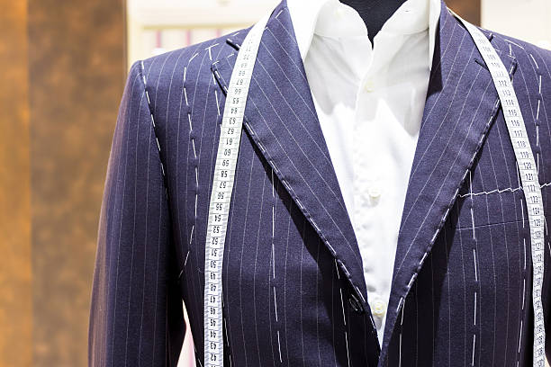 istock Suits on shop mannequins 457043215