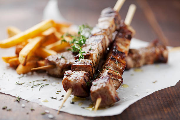 meat skewers meat skewer with chips skewer photos stock pictures, royalty-free photos & images