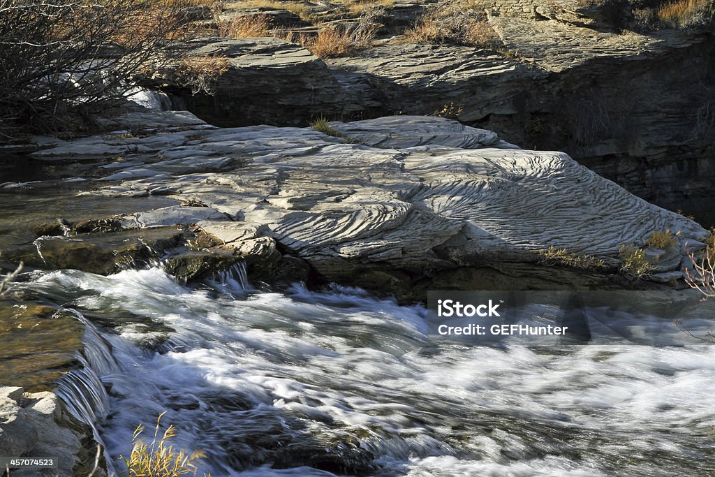 Lundbreck Falls in Alberta Peculiar striations create interesting rock formations at Lundbreck Falls in Southern Alberta. Alberta Stock Photo