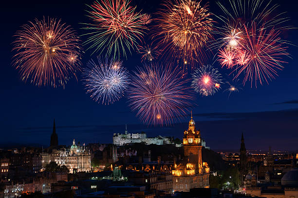 New Years fireworks New Years fireworks over the city of Edinburgh with major famous attractions such as the Castle, Princes Street and other heritage buildings. edinburgh scotland photos stock pictures, royalty-free photos & images