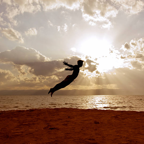 One person acrobatic jumping scene, look like Peter Pan is flying, symbolize vitality, aspiration, success, progress as well as fantasy, imagination, incentive, personal development, power, Agility and much more…