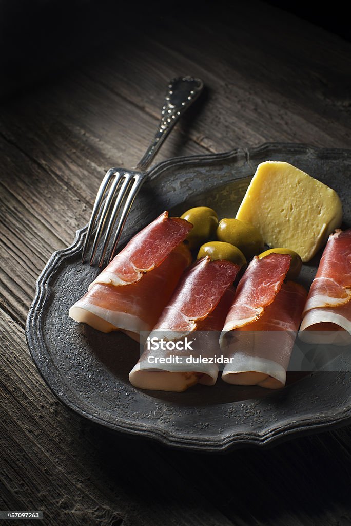 ham Prosciutto with olives and cheese close up Ham Stock Photo