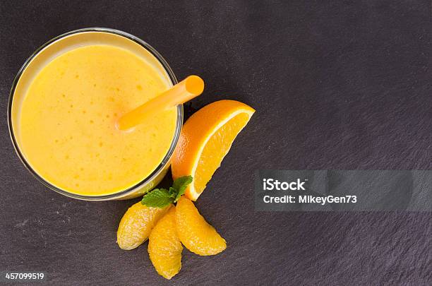 Orange Smoothie Stock Photo - Download Image Now - Smoothie, Drinking Straw, Orange - Fruit