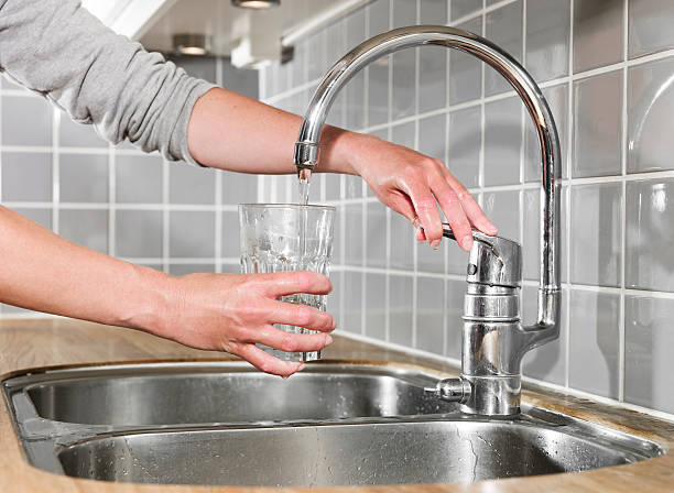 istock Filling a glass of water 457099639