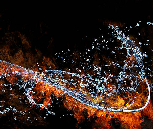 istock Flames and water mixing on black background 457158573