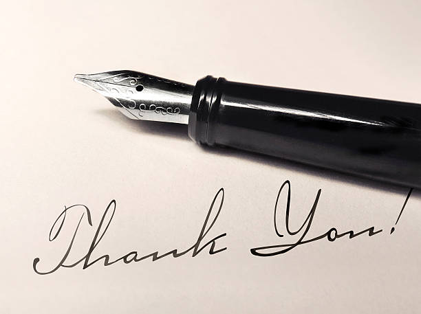 istock Thank you note written with calligraphy pen 457170413
