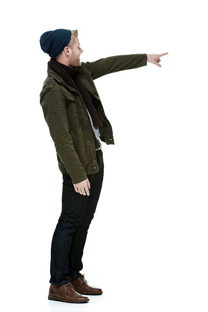 istock Happy man standing and wearing winter clothing 457207129