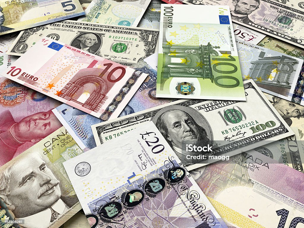 Pile of international currency bills A lot of contemporary banknotes of different countries American One Dollar Bill Stock Photo