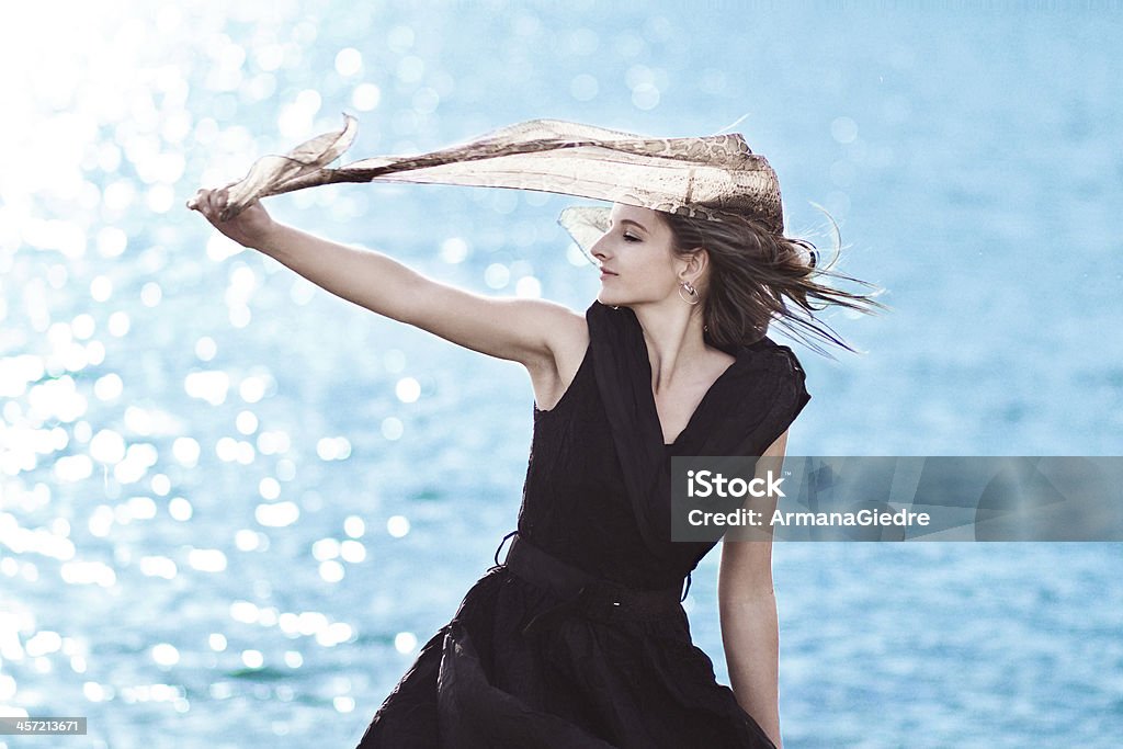 Summer freedome Girl holding a scarf 20-29 Years Stock Photo