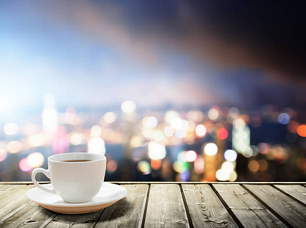 istock coffee on table in the night city 457215691