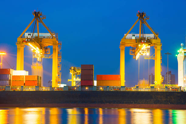 The port cargo freight ship with twilight stock photo